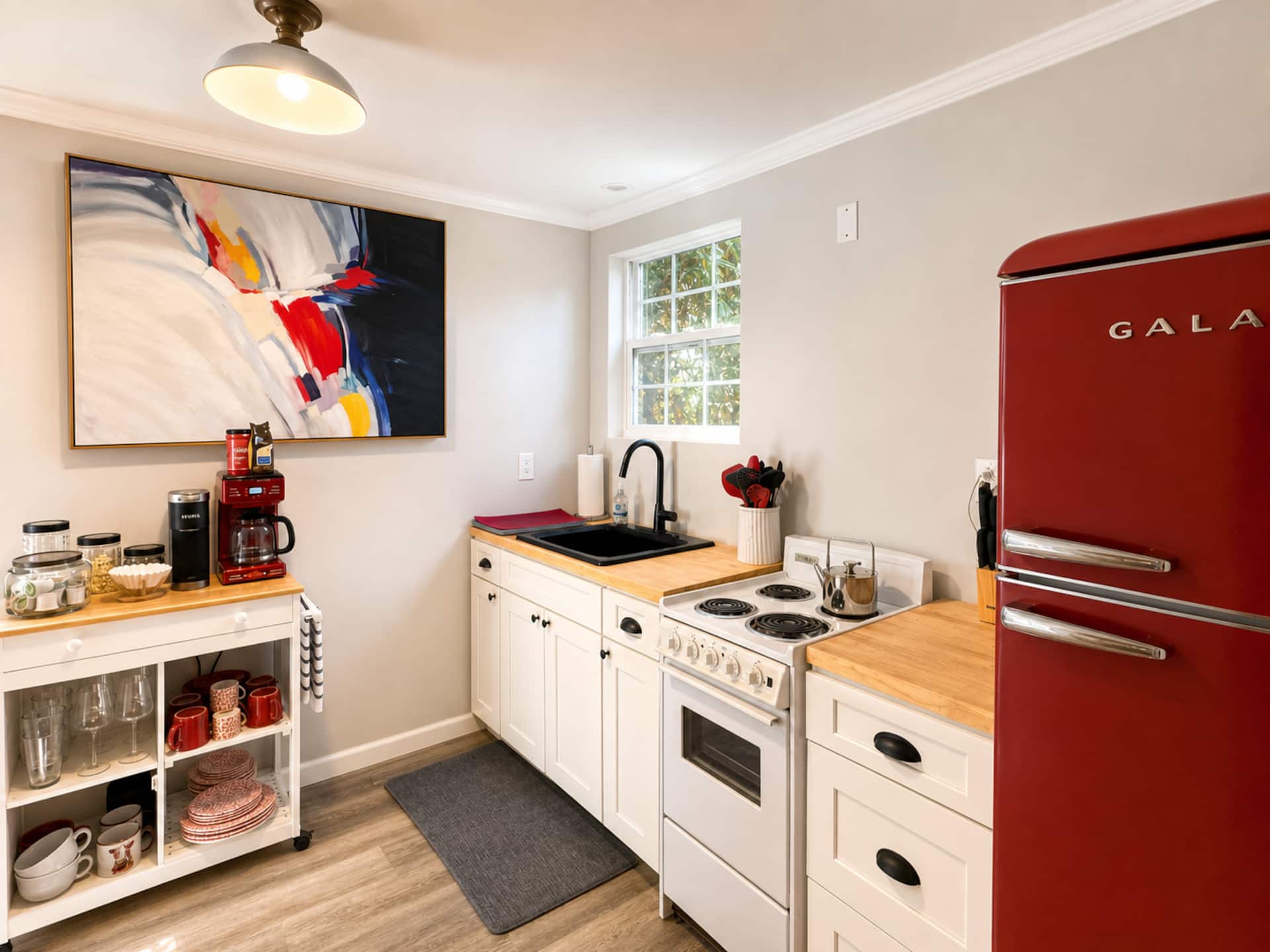 Kitchen with red refrigerator